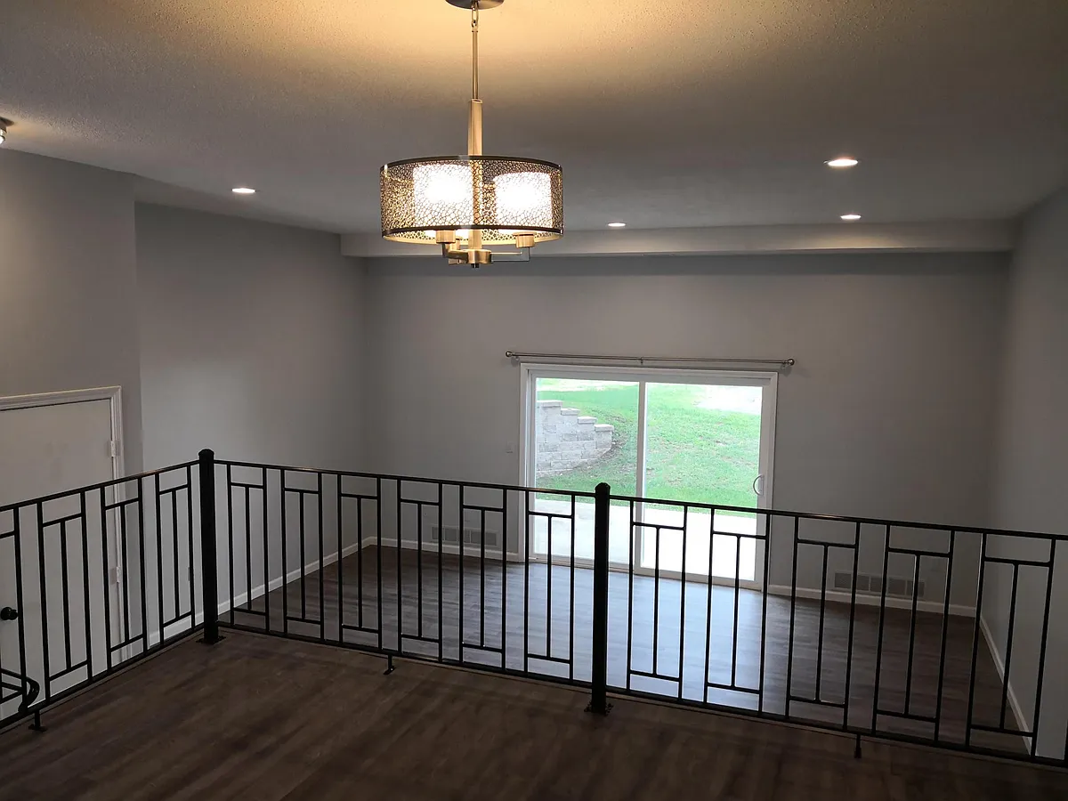 Dinning room with custom wrought iron railings - 165 Brittany Farms Rd #C