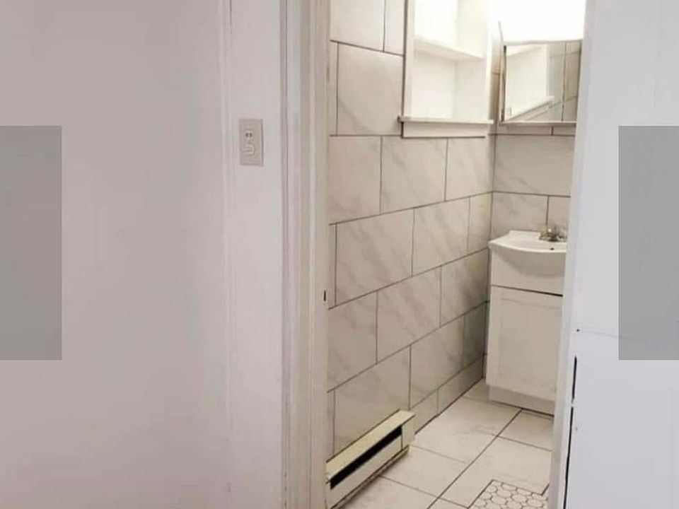 Bathroom offers new tile throughout