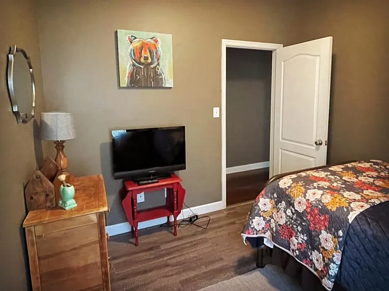 Middle bedroom. Smart TVs are connected to Google Fiber.
