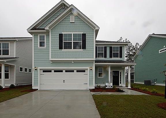 Photos are of a similar home