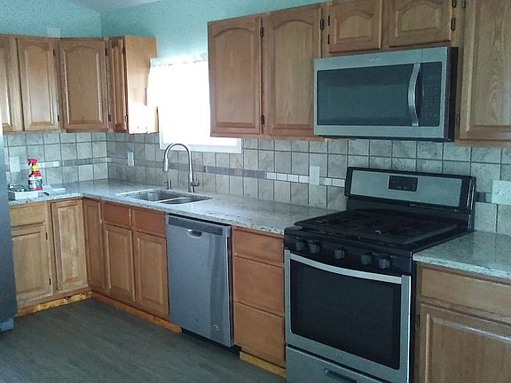 New stainless steel appliances frig with water ice dispenser
