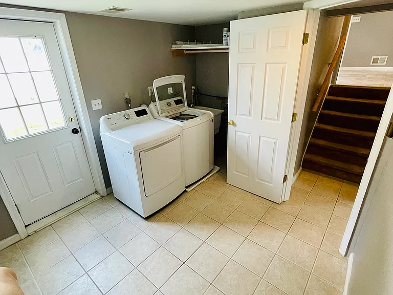 Laundry Utility Room - Door to the backyard.