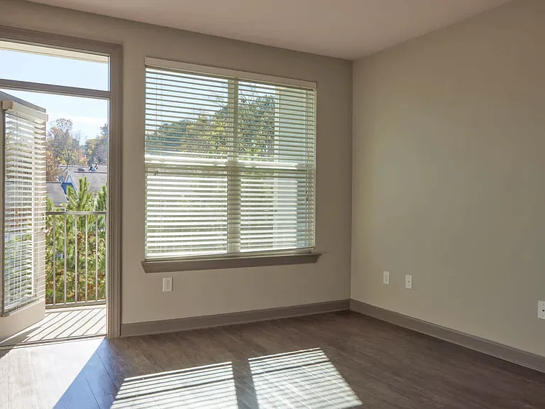 Living Room with Balcony and Hard Surface Flooring