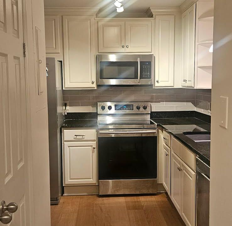 Kitchen with stainless appliances and granite counter tops