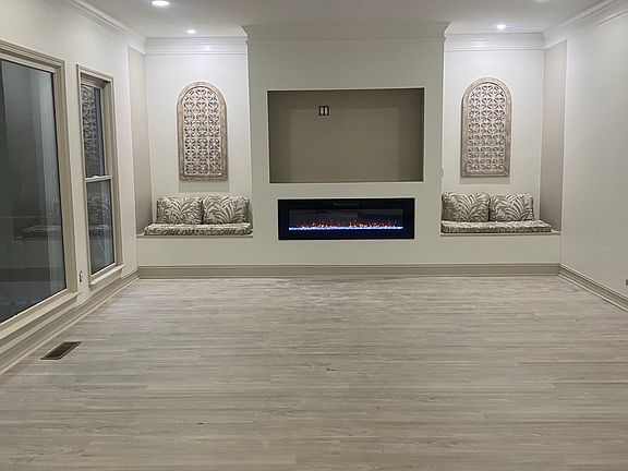FAMILY ROOM WITH LED FIREPLACE, RECESS FOR TV, & LED LIGHTS