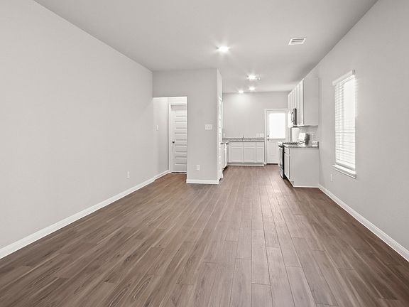 Family Room to Dining and Kitchen