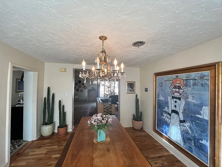 Dining room looking into living room.