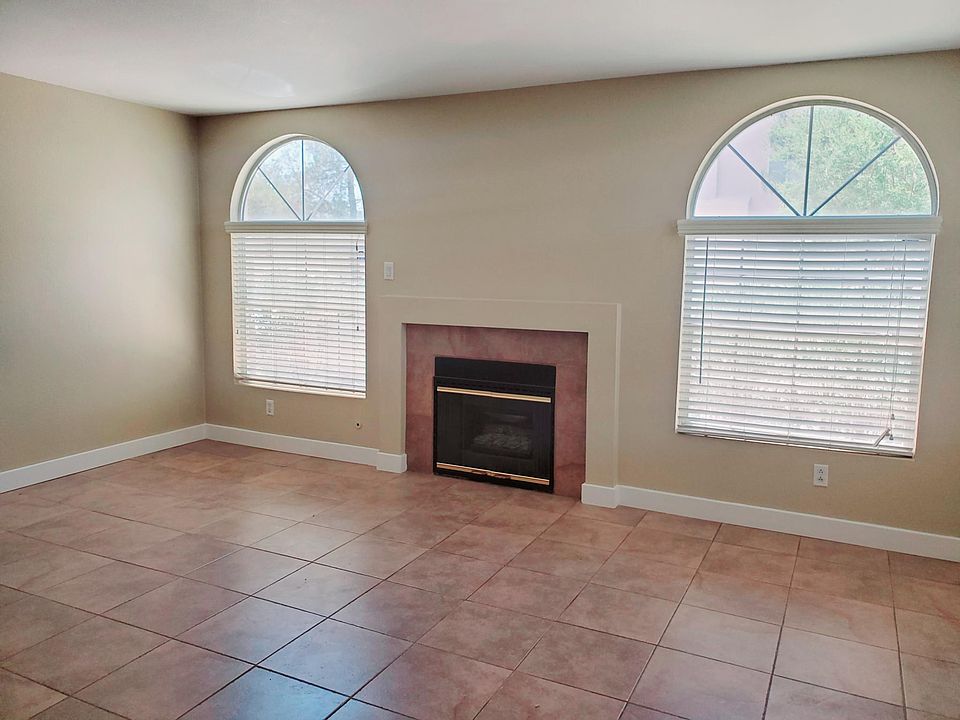Bright Living room with gas fireplace.