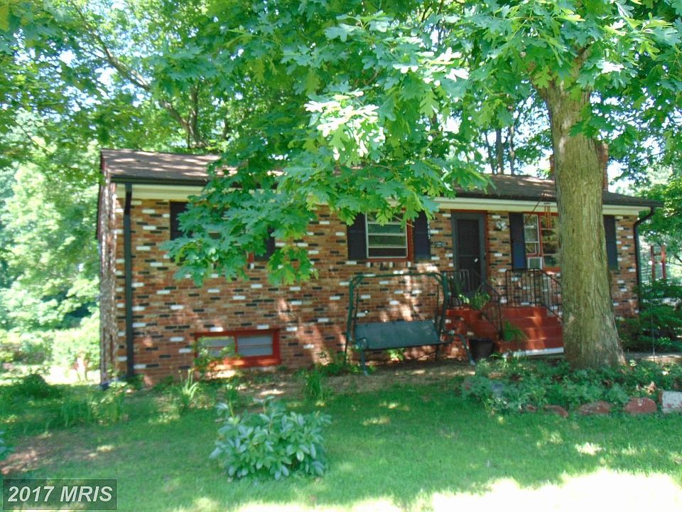 Solid brick rambler on 1/2 acre lot