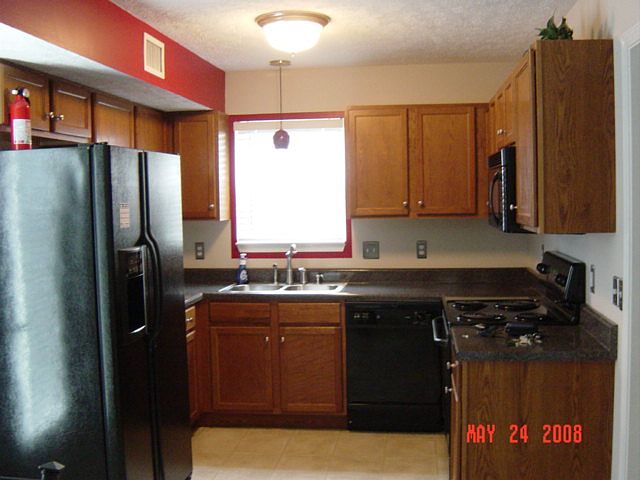 (Nice  kitchen with designer colors.