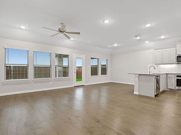 Open first floor in the Pulitzer home plan by Trophy Signature Homes - REPRESENTATIVE PHOTO