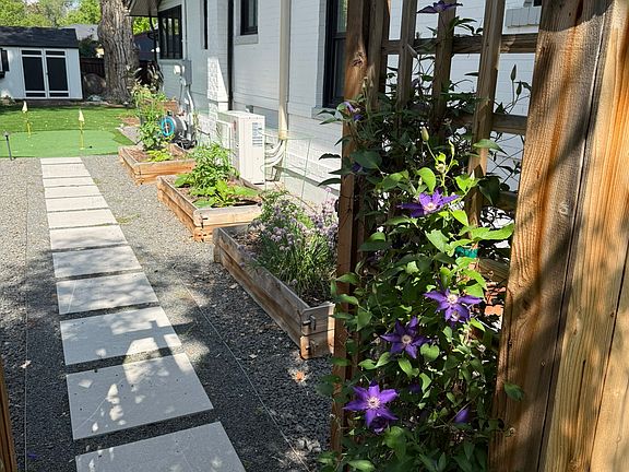 3 custom cedar raised planting beds for vegetables and 1 waist-high raised herb garden