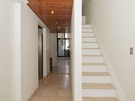 apartment foyer/steps to loft bedroom