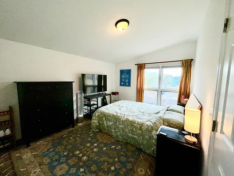 BEDROOM WITH CATHEDRAL CEILINGS