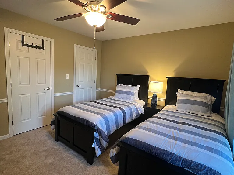 3rd bedroom- 2 twin beds, dresser, 2 closets