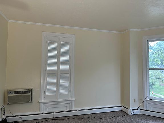 Interior shutters provide privacy. Through-the-wall A/C offers quiet comfort. Hot water baseboard heat is included and is draft-free.