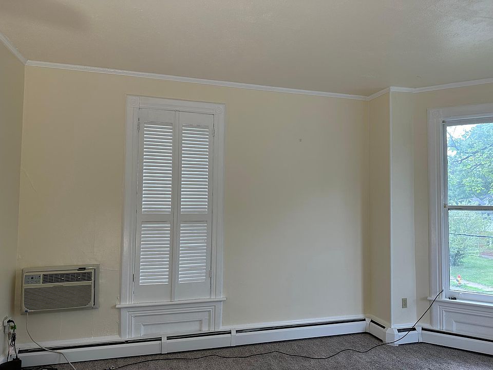 Interior shutters provide privacy. Through-the-wall A/C offers quiet comfort. Hot water baseboard heat is included and is draft-free.