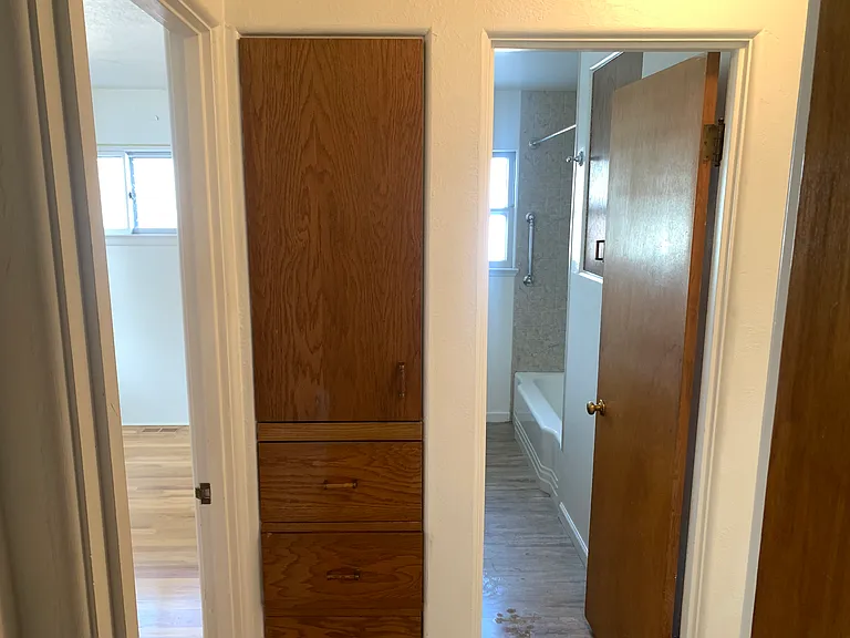 Great closets and built in cabinets in hallway.