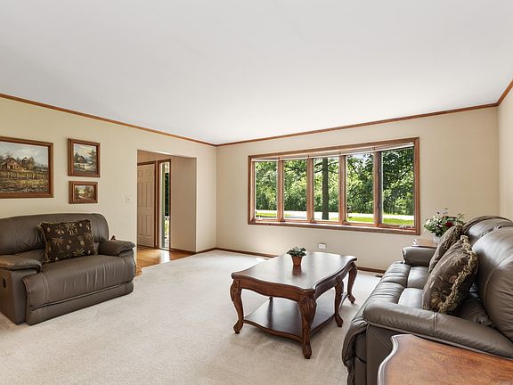 Living Room captures a ton of light through the bay window.