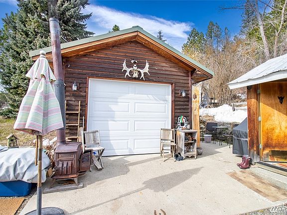 A REAL garage in Roslyn! This garage was erected in 2001. It has a concrete floor & apron. Power to the garage & wired with 220. Man door on the side!