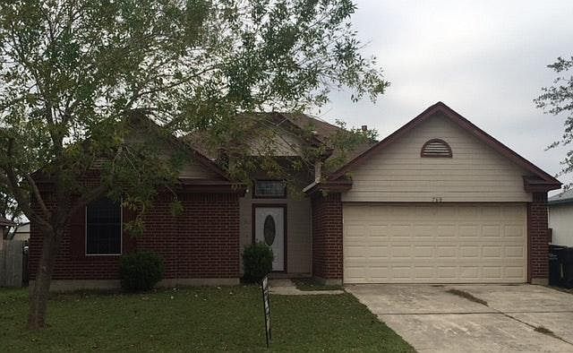 Brick exterior and nice trees