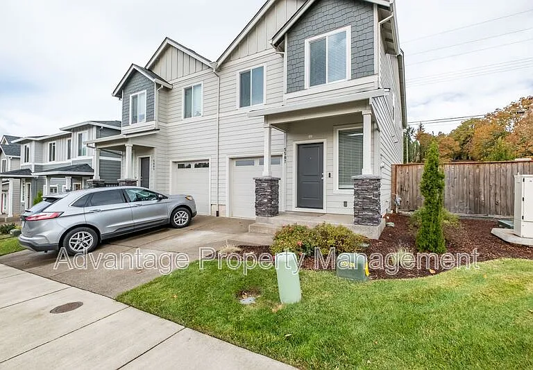 5587 NW Torchcrest Pl — Photo 2