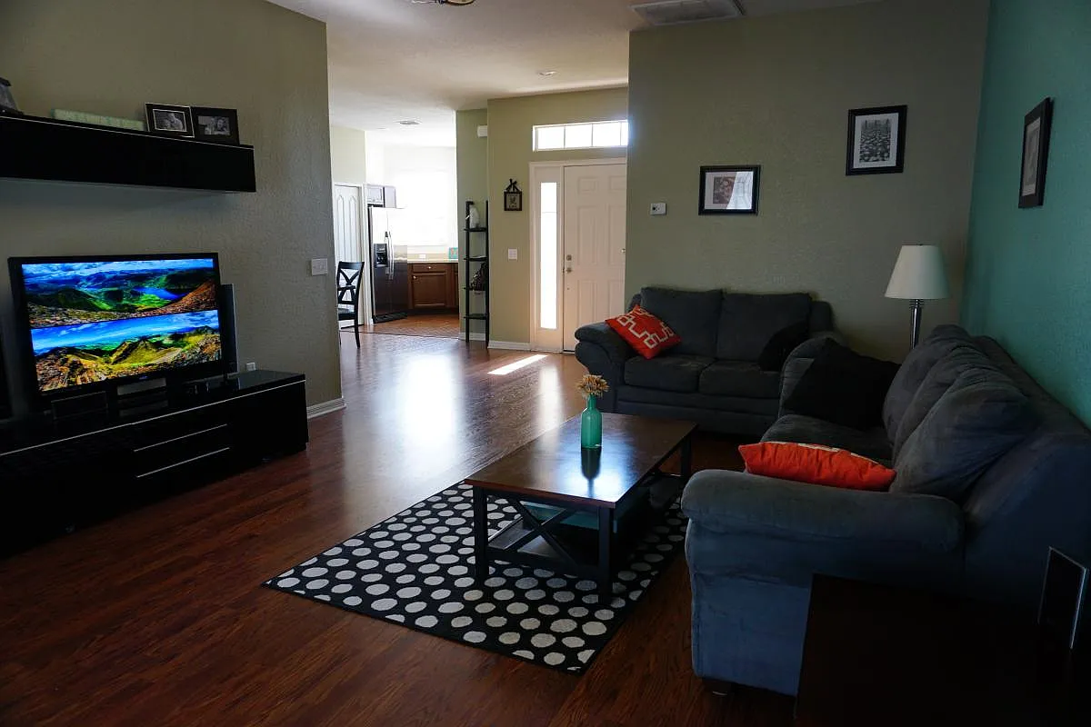 Living Room (The "teal" wall is now painted the neutral color you see in the rest of the living room) - 5014 Yellowtop Loop