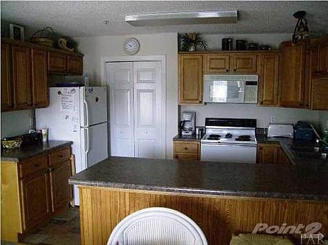View of kitchen from dining area.