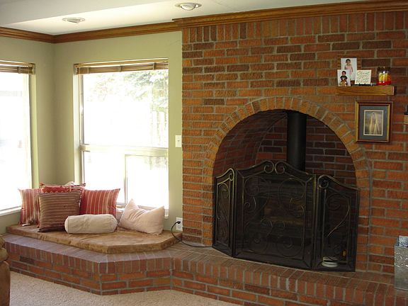 Great room fireplace and window seat