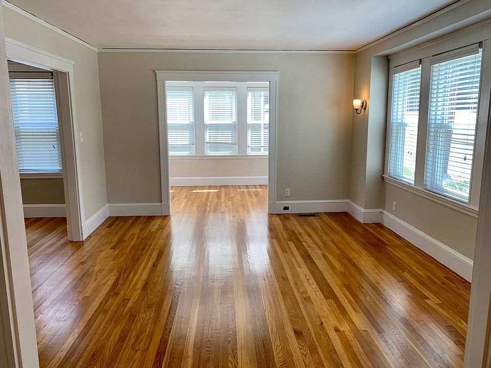 Living room looking into sunroom/office