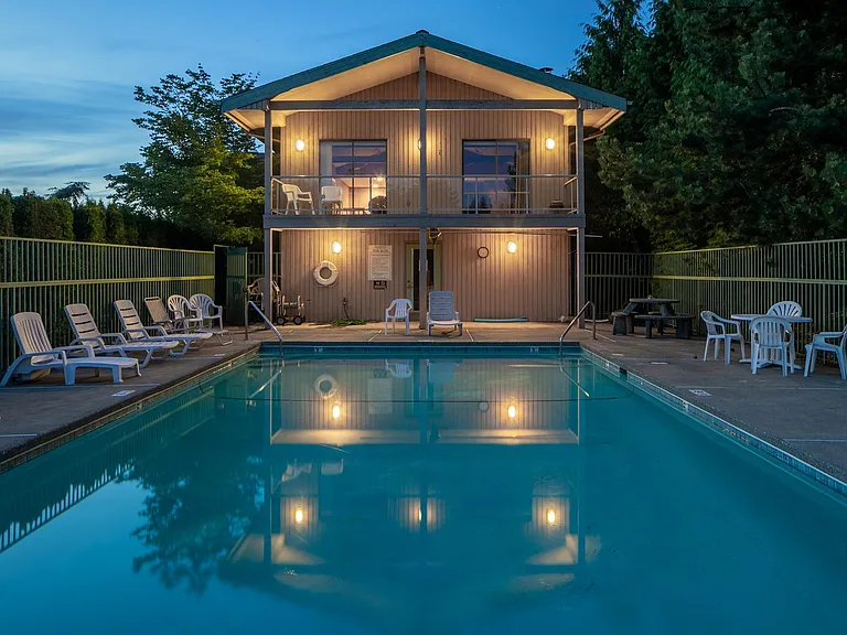 pool area with fitness and game room, showers, kitchen inside clubhouse. adjacent is sport court/tennis/basketball