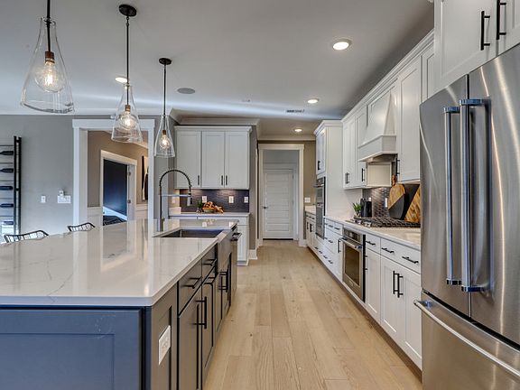 The kitchen offers plenty of space for cooking and gathering