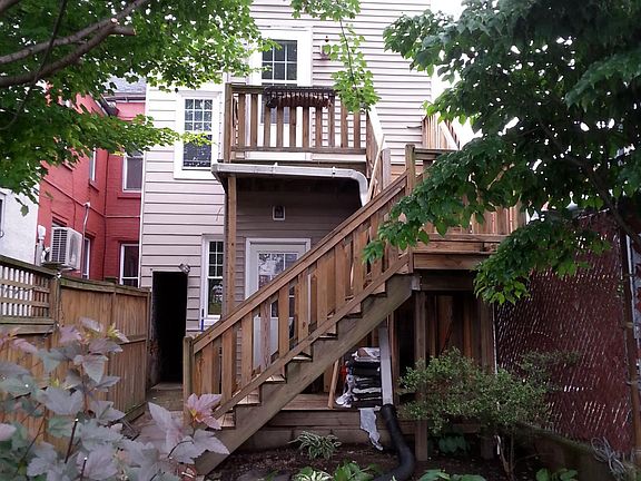 Apartment from Landscaped Garden with Privacy Fencing