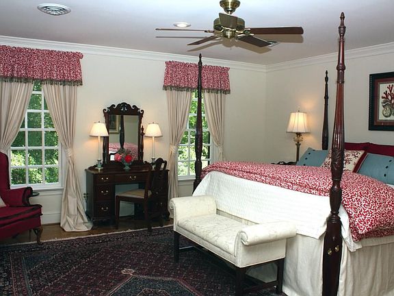 Master bedroom w. his and hers walk in closets.