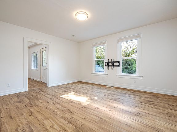 Den/Living room - was used as a bedroom by previous owners. TV mount can be removed if requested.