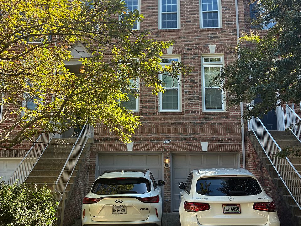 Two car garage with long driveway
