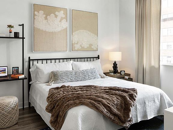 Spacious apartment Bedroom with Wood Floors.