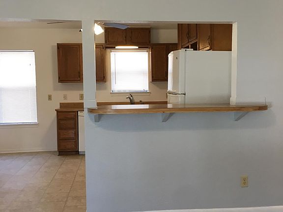 living room into kitchen