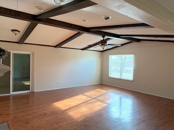 Living area, door to enclosed sunroom