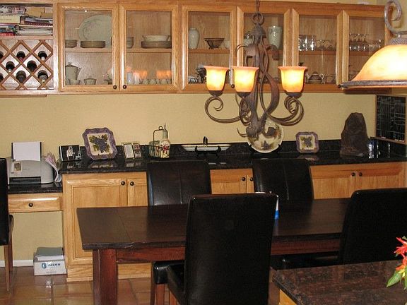 Wonderfulk dining area w/granite topped cabinetry