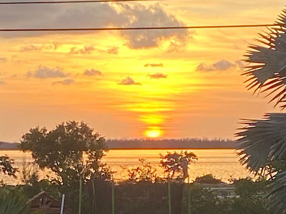 Sunset view from front screened porch