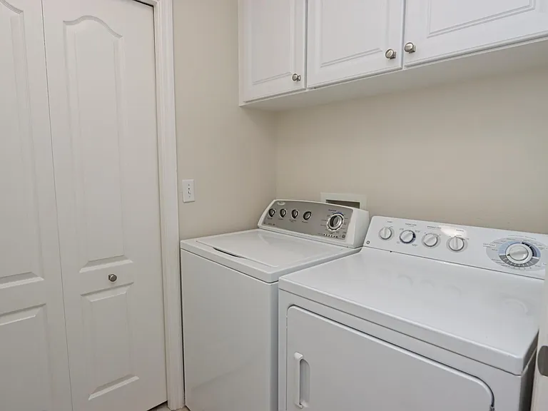 Laundry room w large utility/storage closet