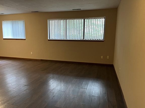 Standing in the doorway, looking at the living room space.