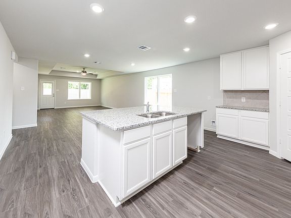 Kitchen to Dining Area and Family Room