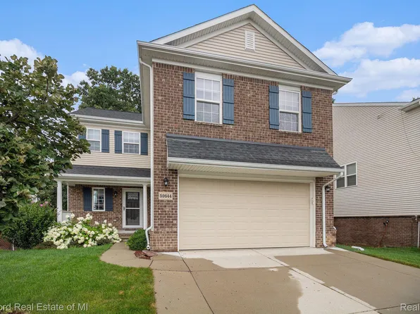 59644 Twin Pines Dr, New Hudson, MI 48165