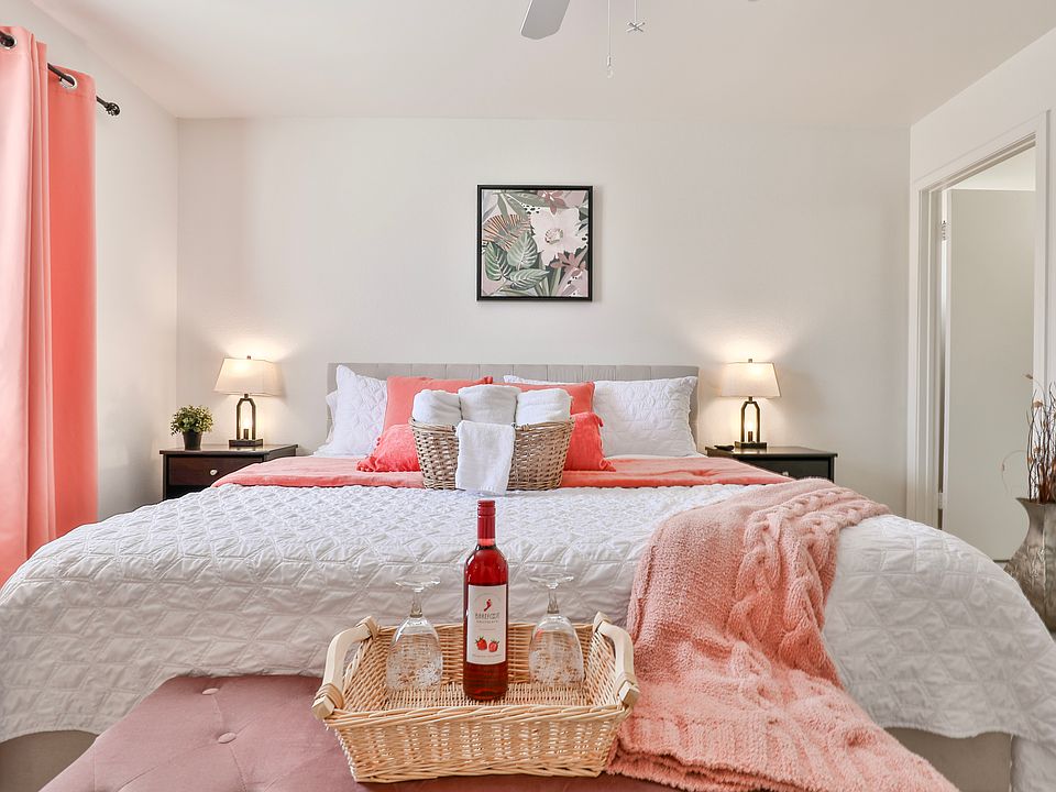 Unwind your day in beautiful coral theme master bedroom.