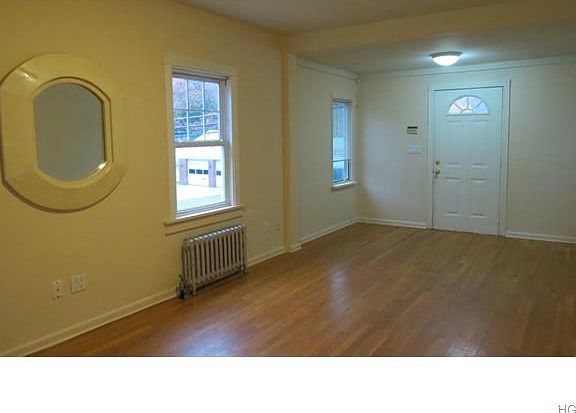 Open Floor Plan for Easy Living! New Hardwood Floors and Freshly Painted