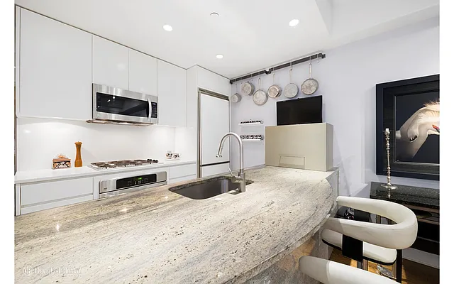 Sold by Douglas Elliman | media 13