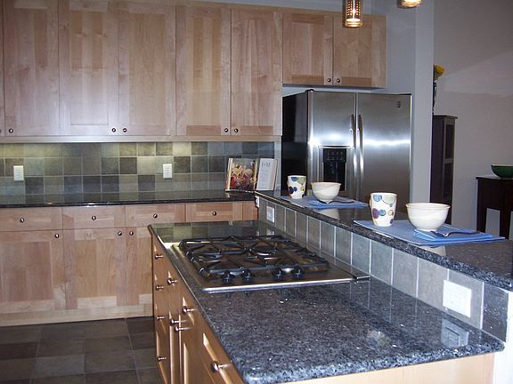 GE Profile Appliances with beautiful Blue Pearl granite