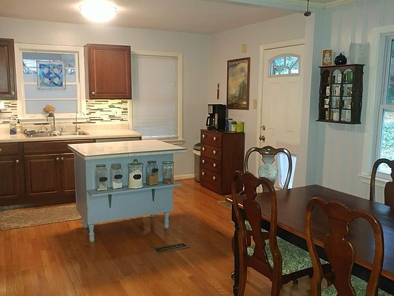 kitchen/dining room with door to backyard
